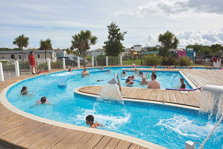 Outside swimming pool at Presthaven Sands Holiday Park