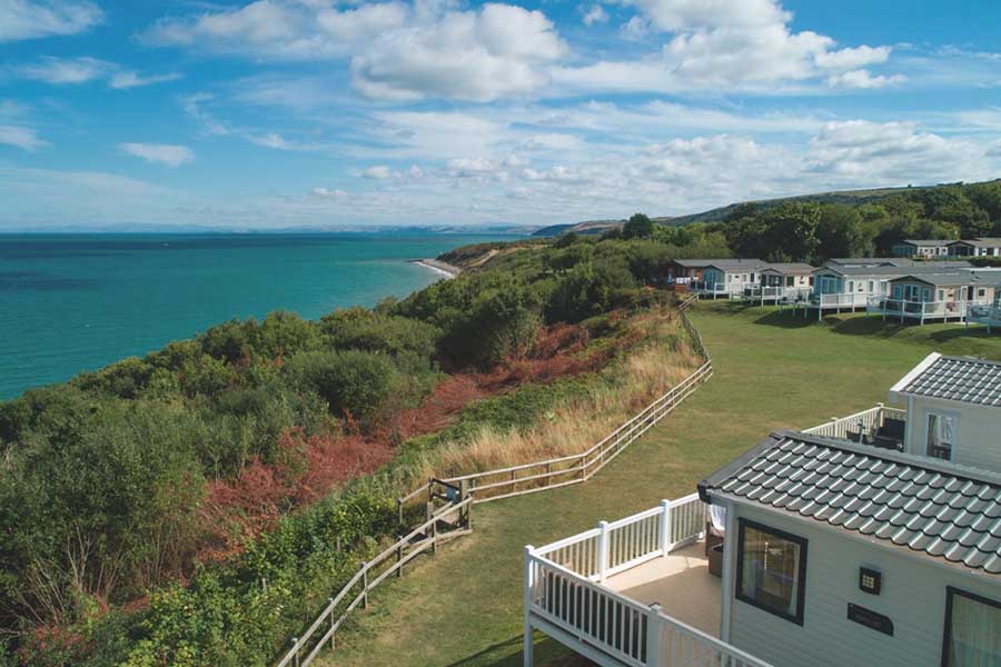 View of the caravans overlooking the beach at Quay West Holiday Park